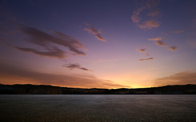 Wall Mural - empty asphalt floor with sunset sky