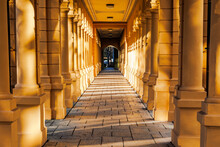 The Columns Of The Walkway In The Hessinpark In Augsburg Shine In The Golden Sunlight