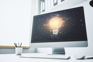 Poster - Modern computer monitor with creative light bulb hologram, research and development concept. 3D Rendering