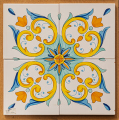 Sticker - Abstract ceramic background. Italian traditional patterns on tiles, handmade craft painting - flowers, yellow and blue colors.