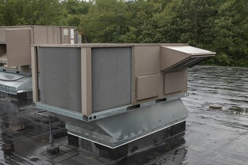 Air condition cooling equipment on a roof of a commercial building