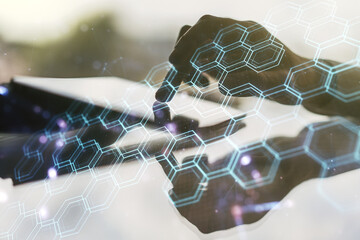 Poster - Creative abstract wireless technology hologram with hexagon and finger presses on a digital tablet on background, artificial intelligence and machine learning concept. Multi exposure