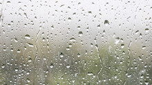 Panoramic Background - Raindrops And Trickles Of Rain Close Up On Window Glass In Heavy Rain
