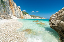 Waves Of The Turquoise Clear Sea Washing The White Stones Of Fteri Beach, Kefalonia, Ionian Islands, Greek Islands, Greece
