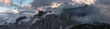 Panorama of a sunrise with low clouds in the Dolomites of Lastoni di Formin and Croda da Lago, Veneto, Italy