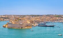 Fort St. Angelo, Grand Harbour, with the superyacht Maltese Falcon at anchor, Valletta, Malta