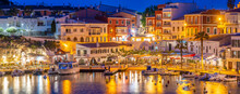 View Of Cafes, Restaurants And Boats In Harbour At Dusk, Cales Fonts, Es Castell, Menorca, Balearic Islands, Spain