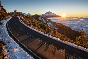 Sticker - Beautiful view of the road surrounded by snow volcano on the Teide volcano background