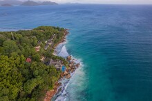 Aerial View Of Anse Patates And Patatran Village, La Digue Island, Seychelles By The Water