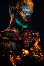 Portrait Of A Man Painted In Fluorescent UV Colors.
