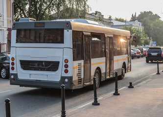 Wall Mural - bus moves along the city street.