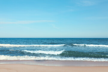 Picturesque view of beautiful sea and sandy beach on sunny day