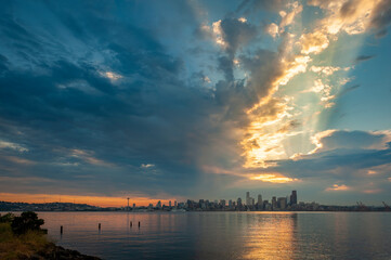 Wall Mural - Seattle Skyline During the Morning Blue Hour Seen From West Seattle.  Dynamic view of the Seattle cityscape just before dawn with Elliott Bay in the foreground and the waterfront in the distance. 