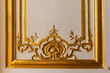 © Евгения Смульская - Fragment of the arch of a historic building with a golden base.