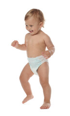 Poster - Cute baby in diaper learning to walk on white background