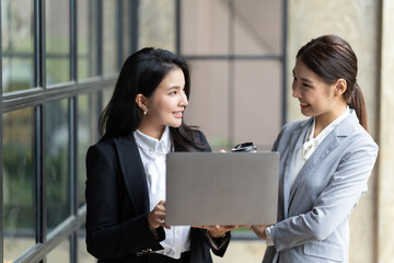 Wall Mural - Confident focused businesswoman, teacher or mentor coach speaking to business people at negotiations, woman leader speaker applicant talking at meeting or convincing hr during job interview concept