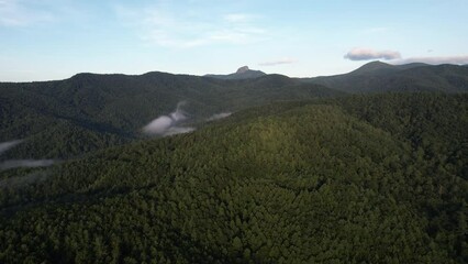 Wall Mural - Drone shot of Table Rock Mounatin in the Blue Ridge Mountains and the Pisgah National Forest, North Carolina, rotating