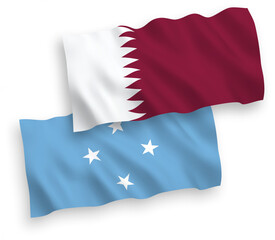 National vector fabric wave flags of Federated States of Micronesia and Qatar isolated on white background. 1 to 2 proportion.