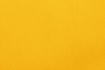 Wall Mural - Yellow cotton fabric cloth texture background, seamless pattern of natural textile.