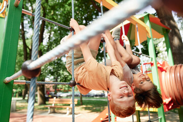 Wall Mural - Portrait of caucasian boys at playground