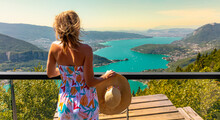 Woman Enjoying Amazing View Of Annecy Lake In France