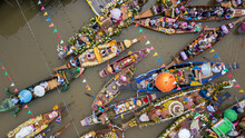 Aerial View Floating Festival In Thailand, People Enjoy The Candle Procession In The River Ceremony, The Buddhist Lent Day In Lad Chado, Ayutthaya, Thailand.