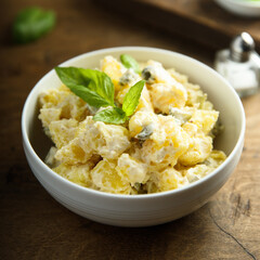 Wall Mural - Traditional homemade potato salad with gherkins	