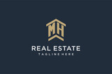 Fototapeta  - Initial MH logo for real estate with simple and creative house roof icon logo design ideas