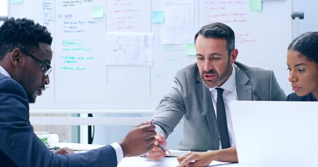 Poster - A group of creative businesspeople having a meeting in a modern office. Businessman in suit talking to colleague or partners sitting at conference table. Male leader discussing work at team meeting