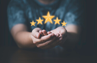 Fototapete - Businessman showing glowing yellow five stars for excellent evaluate after customer use product service , ISO and quality standard certificate concept.