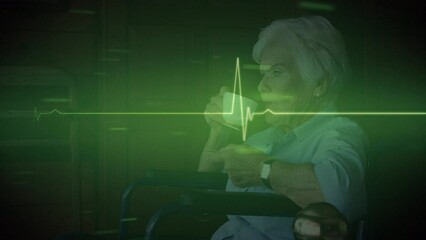 Poster - Animation of cardiograph over senior caucasian woman in wheelchair with coffee