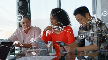 Poster - Animation of network of connections with icons over diverse business people using electronic