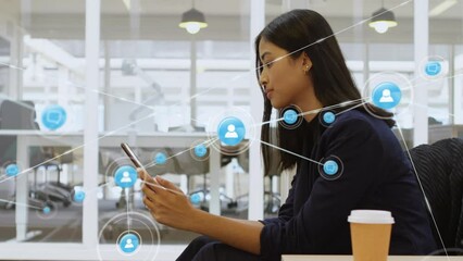 Poster - Animation of network of connections with icons over biracial businesswoman using smartphone
