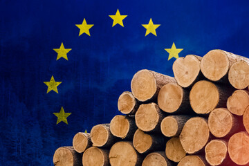 EU flag and tree logs. Concept of economic fuel crisis, fuel default. Refusal of gas