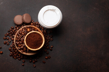 Wall Mural - Takeaway cup, roasted coffee beans and ground coffee