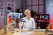 © Sofiia Shunkina - Female scientist working in modern lab. Doctor making microbiology research. Laboratory tools: microscope, test tubes, equipment. Coronavirus covid-19, bacteriology, virology, dna and health care.