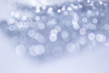 Wall Mural - abstract blurred gray background with circular gray and white bokeh. blur image of an autumn forest 