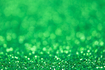 Wall Mural - abstract green bokeh defocus glitter blur background.
