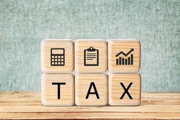 Wall Mural - TAX concept, on wooden block on the desk