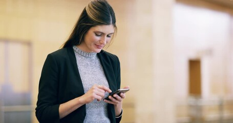 Poster - Business woman browsing on a phone, scrolling through social media or typing a text message online while standing in an office at work. Young, smiling and happy corporate professional checking emails