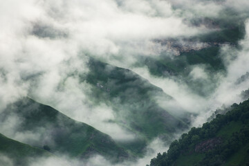 Wall Mural - Morning fog in the mountains at sunrise. Summer landscape