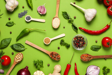 Wall Mural - Different ingredients for cooking on green background