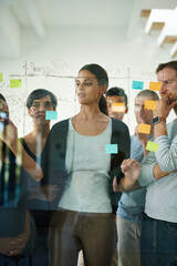 Poster - Group of young business people planning, writing ideas on board and brainstorming in casual design, startup office. Team meeting with professional creative workers. Colleagues thinking in a workshop