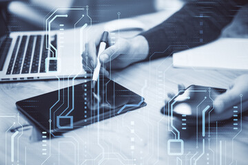 Poster - High-tech sensor circuit board panel. Close up of male hands using tablet and smartphone with hologram. Technology and digital communication concept on blurry background. Double exposure.