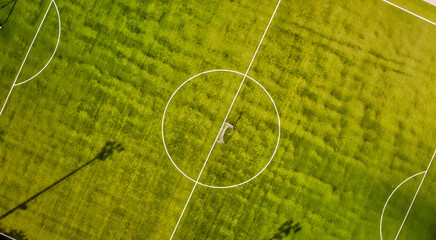 Sticker - Soccer field in the countryside, aerial view from drone