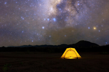 Wall Mural - yellow tent under milky way galaxy lampang thailand, universe galaxy milky way time lapse, dark milk