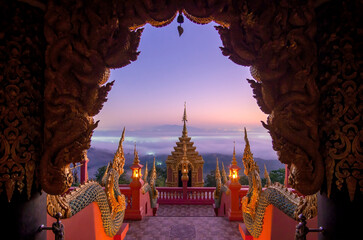 Wall Mural - morning view with sea of fog at wat phra that doi phra chan, lampang, thailand...