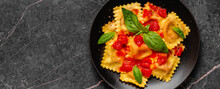 Delicious Appetizing Ravioli With Tomato Sauce And Basil