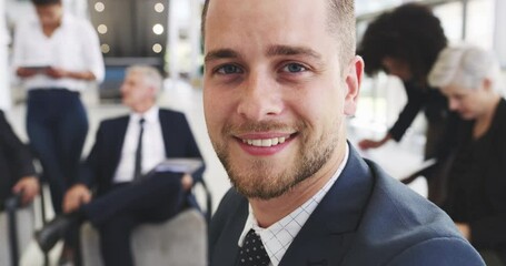 Canvas Print - A confident, smiling and laughing business man happy with his office team in the background. Portrait of a corporate executive POV doing a group work project. Handheld of a male worker with a smile