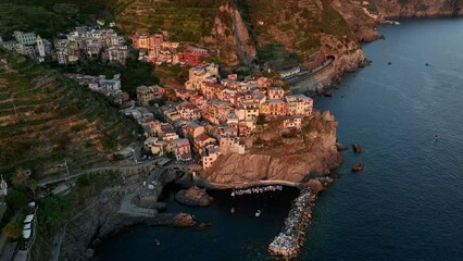 Wall Mural - View from above, stunning aerial view of Manarola, the second village of the Cinque Terre coming from La Spezia. Manarola is the most picturesque village, made up of colorful tower-houses.